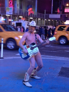 The Naked Cowboy doing his thing in Times Square!